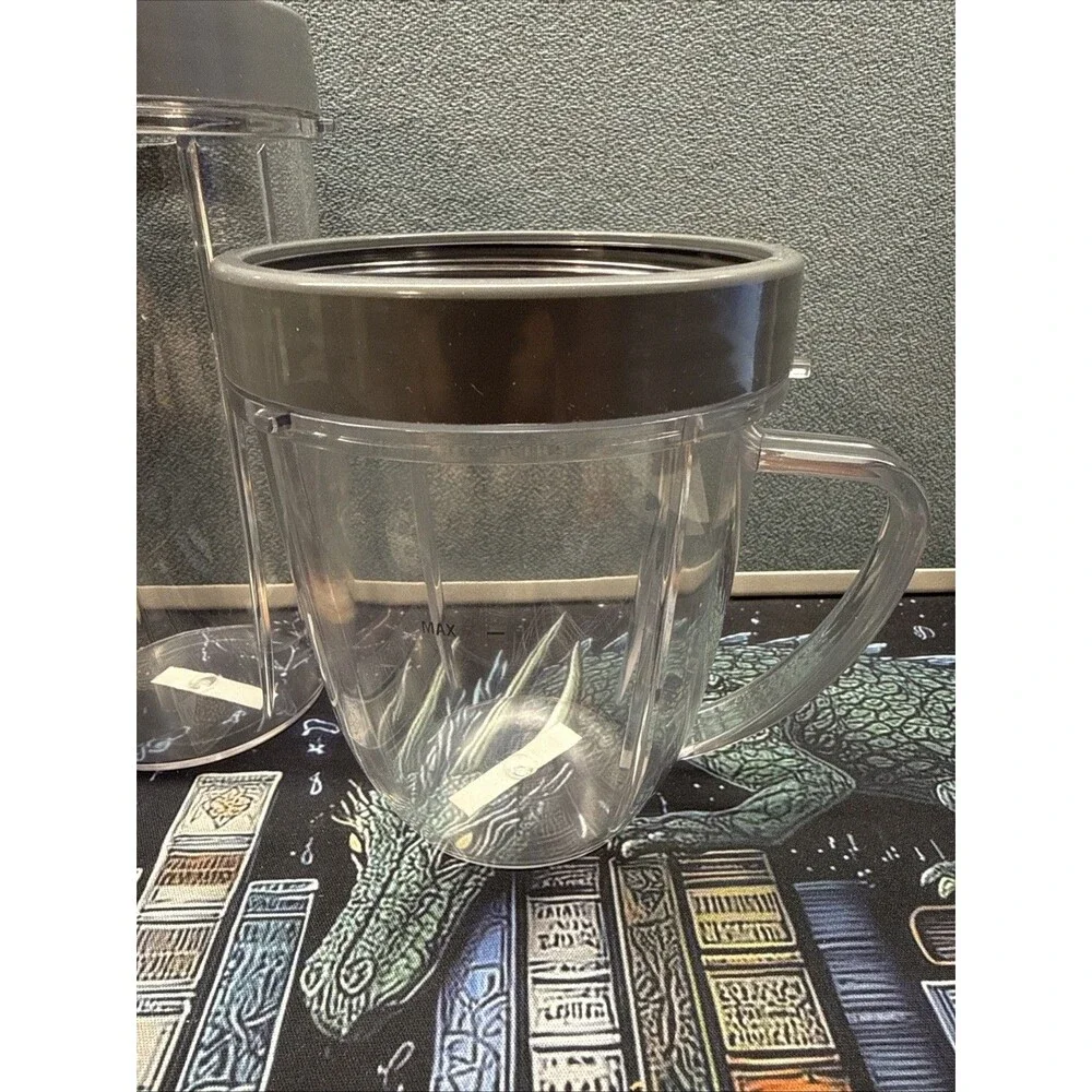 Nutribullet Lot Of 4 Replacement Cups With Lids